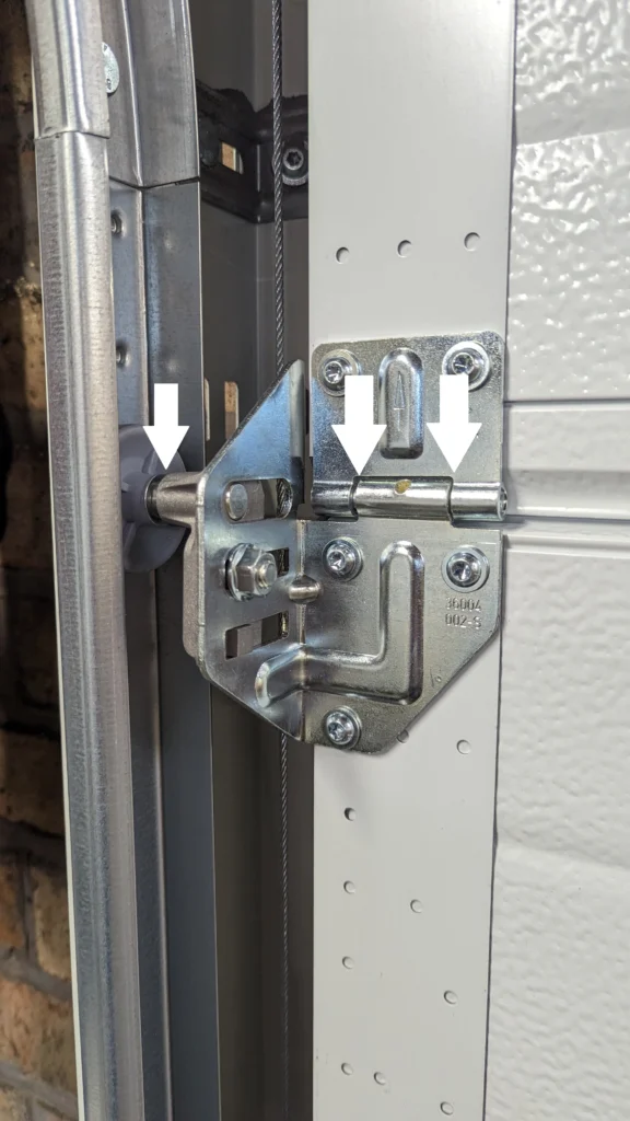 sectional door hinge and roller